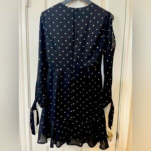 GB size small long sleeve black dress.